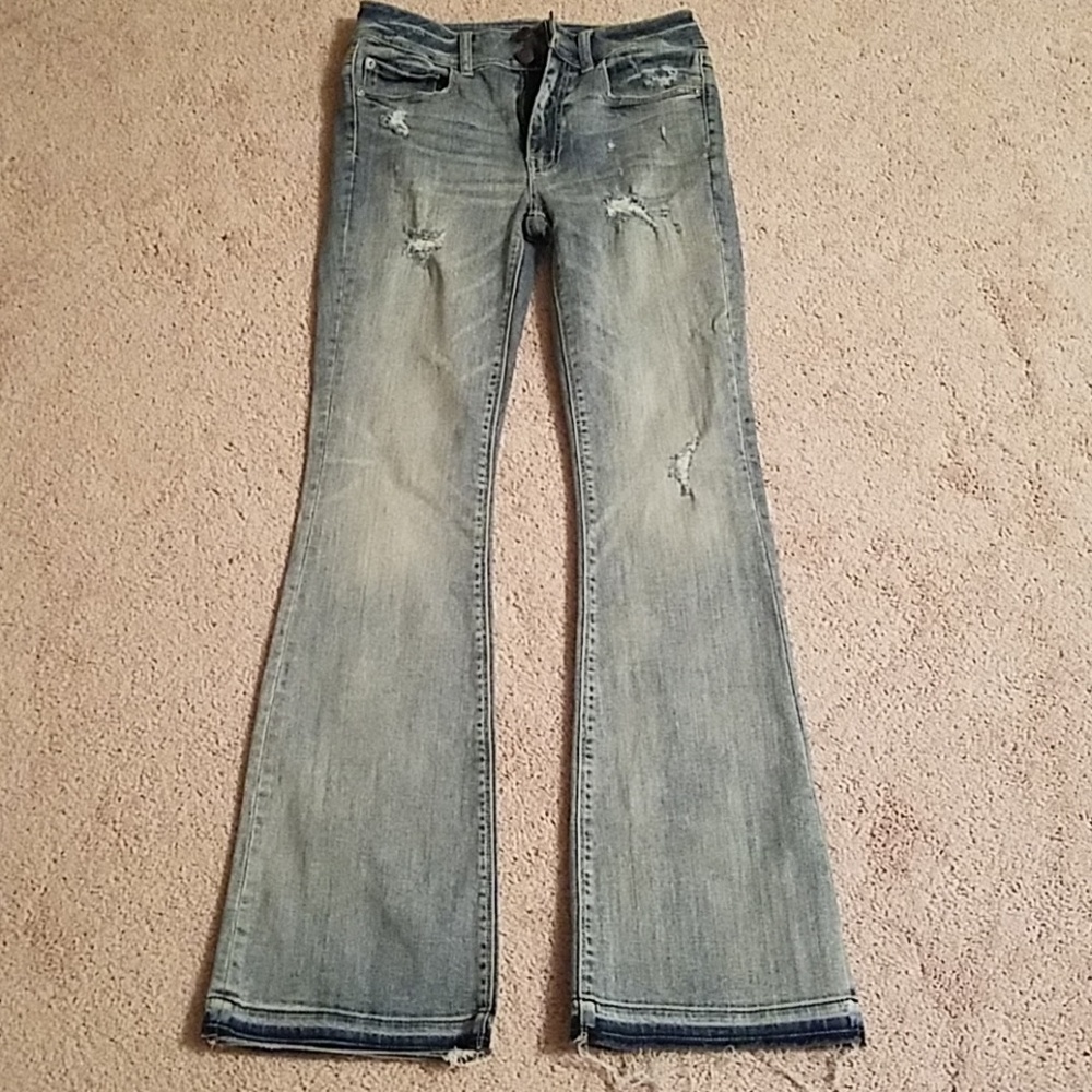 Destroyed high-rise denim jeans